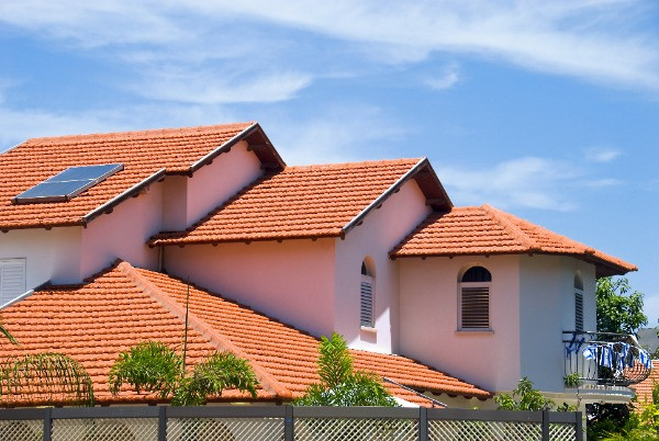 Orange Tile Roof on Two Story House